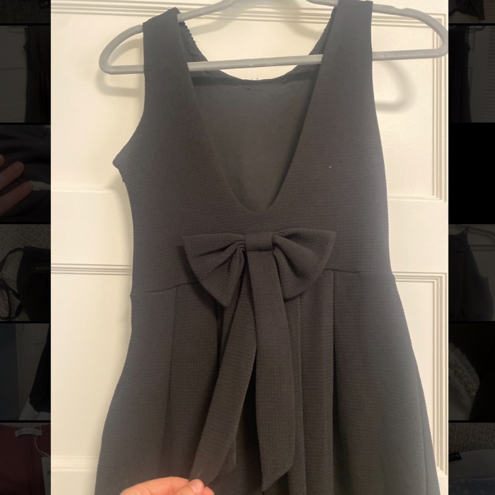 Black mini dress with low back and bow size small